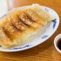 Pork Gyoza Dumplings · Crispy fried dumplings with kurobuta pork