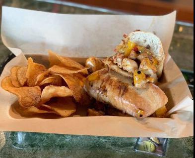 Chicken Philly Sandwich · Thinly sliced chicken breasts, sauteed red and green bell pepper, onion, mushrooms, with your choice of mozzarella or homemade queso.