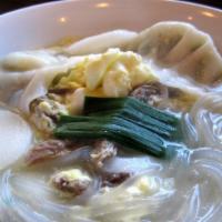  Rice cake /Dumpling Soup (떡만두국) · Rice cake and home made beef dumpling in beef broth with cellophane noodles
(available veggi...
