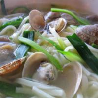 Clam Noodle Soup (조개 칼국수) · Wheat noodles in a clam vegetable broth.