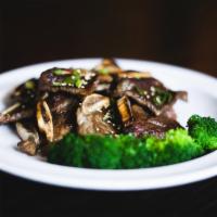 Kalbi (갈비) · Grilled beef shortribs marinated in sweet say, ginger, garlic and sesame sauce.