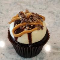 Peanut Butter Cup · Chocolate cupcake topped with our signature peanut butter frosting, peanut butter, and choco...