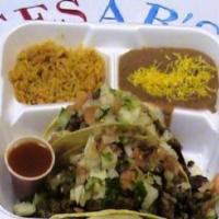 #8. Two Carne Asada Tacos Plate · Corn tortillas with tender beef steak, fresh guacamole and fresh pico de gallo. Served with ...