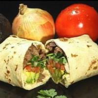 #16. Carne Asada Burrito · Tender 100% beef steak, Cesar’s guacamole fresh from avocado, and fresh pico de gallo.