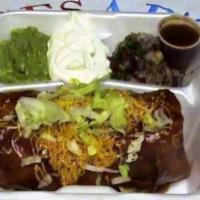#31. Chimichanga · Deep-fried burrito with chicken or marinated beef mixture, comes with sour cream, Cesar’s gu...