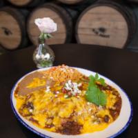 Beef Enchiladas · Our beef enchiladas served with chili con carne.