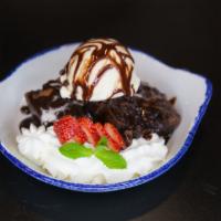 Agave Brownie · Texas size chocolate brownies topped off with vanilla ice cream and served with fresh fruit,...
