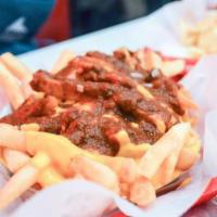 Chili Cheese Fries · Fried potatoes topped with cheese and chili. 
