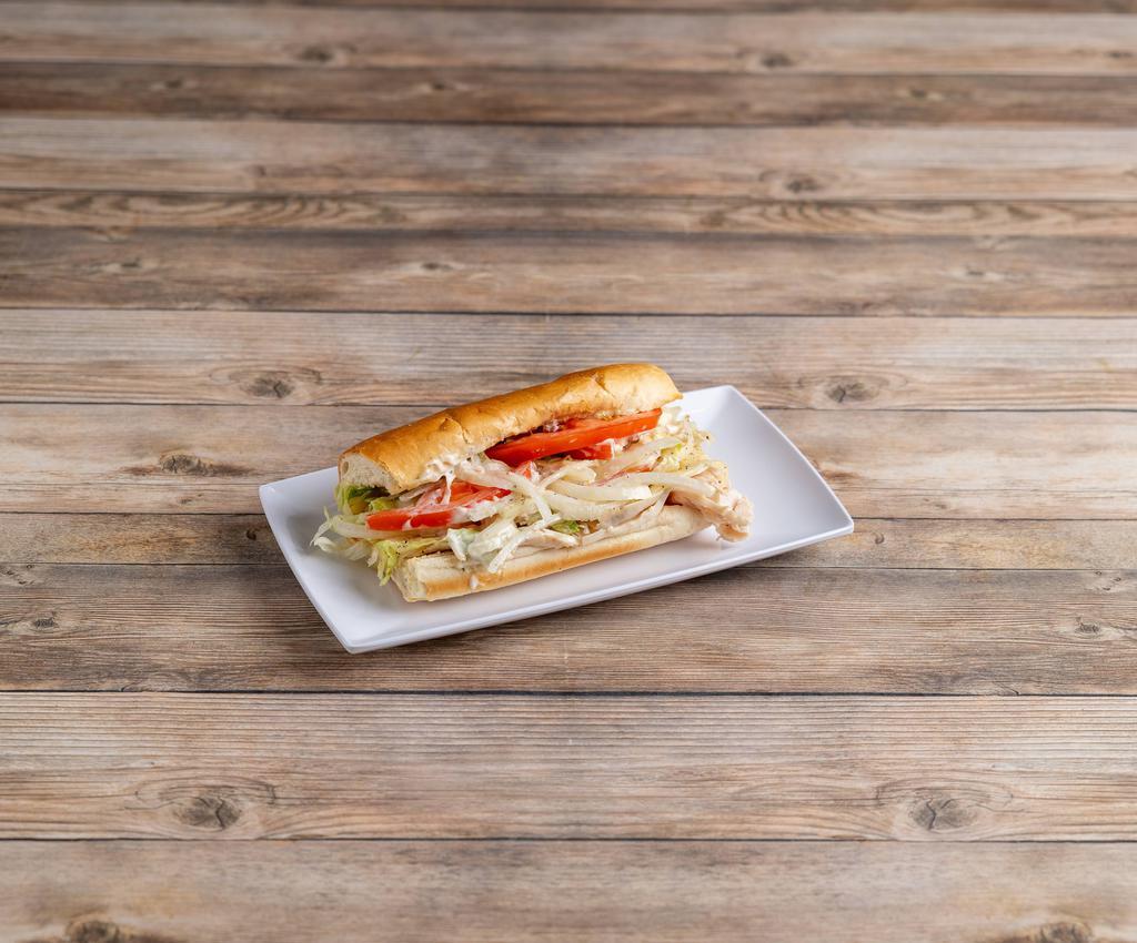 Turkey and Cheese Sub · Turkey and Provolone cheese. Toasted and dressed with Lettuce, Onions, Tomatoes, Black Pepper, Oregano, and Oil & Vinegar Dressing.