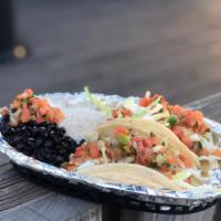 2 Taco Entree  · 2 Tacos, with your choice of protien. 1988 or Citrus Slaw style. With White Rice and Black B...