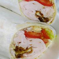 Turkey BLT Wrap · Turkey, bacon, lettuce, tomatoes and mayonnaise. 