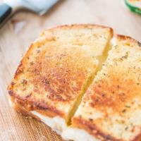 French Breakfast · Brie Cheese, raw organic honey, arugula  on french grain bread