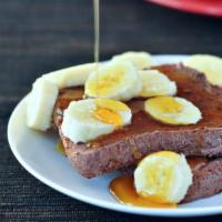 Protein Power Toast · Organic  almond butter, sliced banana,  Chia seeds , spirulina, on 7 grain Toast