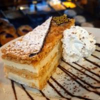 Napoleon · Layers of caramelized puff pastry filled with vanilla cream