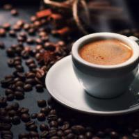 Espresso · A small amount of nearly boiling water is forced under 9–10 bars of pressure (expressed) thr...