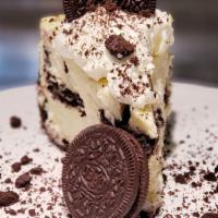 Cookies n Cream Cheesecake · Our Cookies and Cream cheesecake is loaded with cookies and topped with whipped cream.