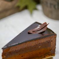 Double Chocolate Cake · Layers of flourless dark chocolate cake and chocolate mousse .(Gluten free)
