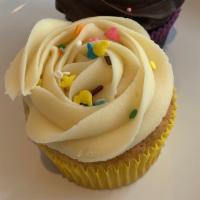 Very Vanilla Cupcake · Our Very Vanilla cupcake topped with our Vanilla Buttercream frosting and then decorated wit...