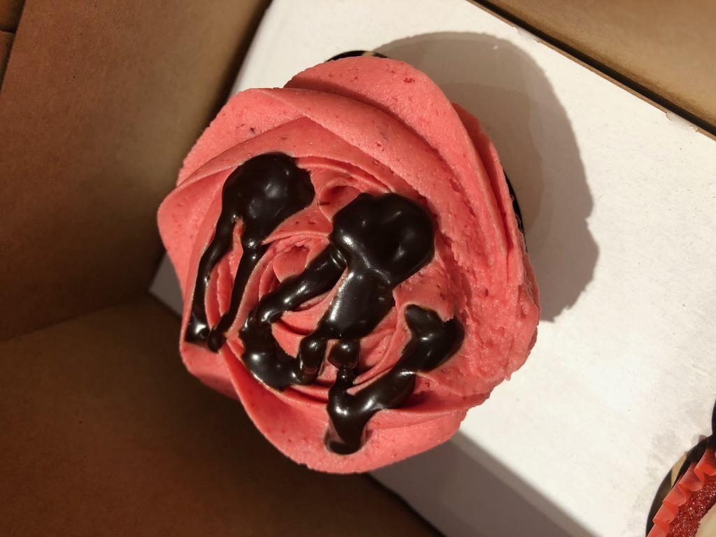 Raspberry Love · Our chocolate cupcake topped with Raspberry buttercream