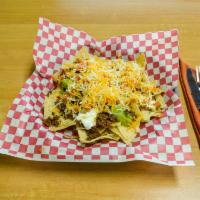 Cali Nachos · Fresh corn tortilla chips with your choice of meat, beans, guacamole, sour cream, pico, and ...