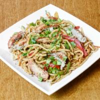 Chicken Stir Fry Noodles · Noodles stir fried with chicken and vegetables.