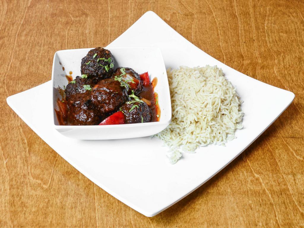 Chicken Manchurian  · Fried chicken balls tossed in exotic Manchurian Sauce with vegetables served with Rice