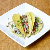 Chicken Momo Taco  · Delicious Taco prepared with Chicken Momo filings, cottage cheese, bell peppers, and onions 