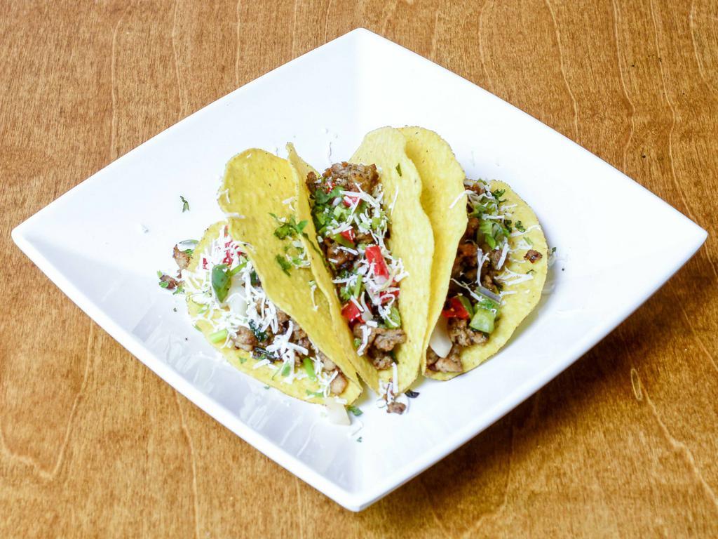 Chicken Momo Taco  · Delicious Taco prepared with Chicken Momo filings, cottage cheese, bell peppers, and onions 
