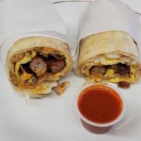 Breakfast Burrito · Comes with 2 eggs, hash browns, and your choice of meat.