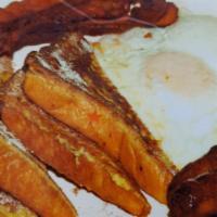 French Toast Plate · 2 pieces of French toast, 2 sausage links, 2 pieces of bacon, 2 eggs cook how you want.