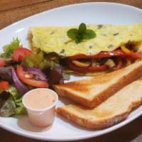 Omelette · Egg is cooked and then folded in half and filled with your choice of mushrooms, onion, and c...