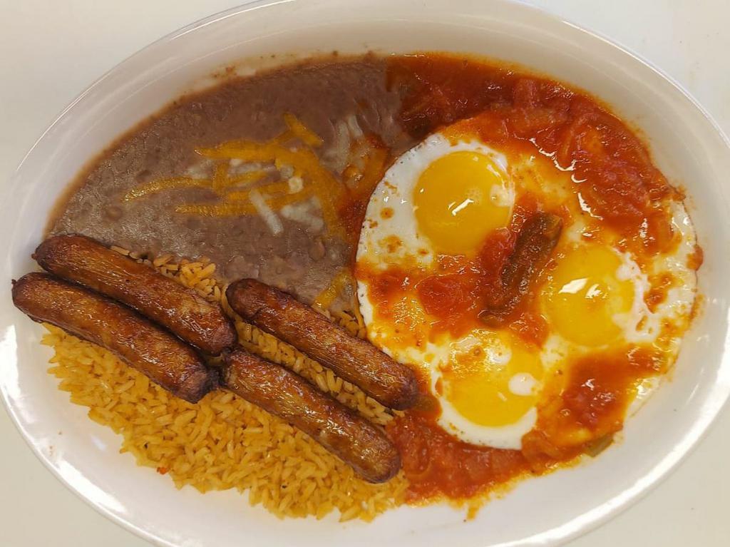 Huevos Rancheros · Comes with 3 eggs cooked how you want and topped with ranchero sauce, and your choice of meat, rice and beans on the side.