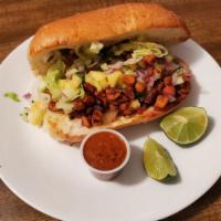 Tortas · Comes with refried beans, mayonnaise, lettuce, pico de gallo, guacamole, red onion and your ...