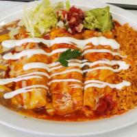 Rolled wet tacos (enchiladas)  · 3 corn tortillas with your choice of filling, and topped with enchilada sauce, cheese, and s...