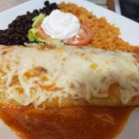 Wet burrito plate · Comes with rice, beans, and your choice of meat. Topped with ranchera sauce, cheese, and sou...