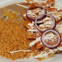 Chiliquilies  · Comes with homemade chips, mixed with your choice of red sauce, green sauce, or mole sauce, ...