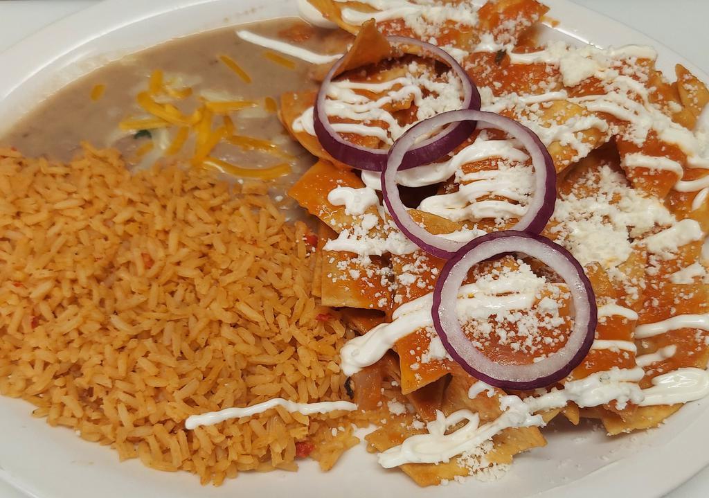 Chiliquilies  · Comes with homemade chips, mixed with your choice of red sauce, green sauce, or mole sauce, and topped with cojita cheese, sour cream, onion, and cilantro. With rice and refried beans on the side. You can also add 2 eggs or your choice of meat for an additional charge. 
