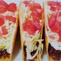 Hard Shell Taco · Comes of a crunchy corn tortilla with lettuce, tomato, cheese, sour cream, and your choice o...