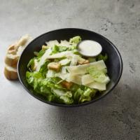 Caesar Salad · Crisp romaine tossed with croutons, Caesar dressing, and grated cheese.