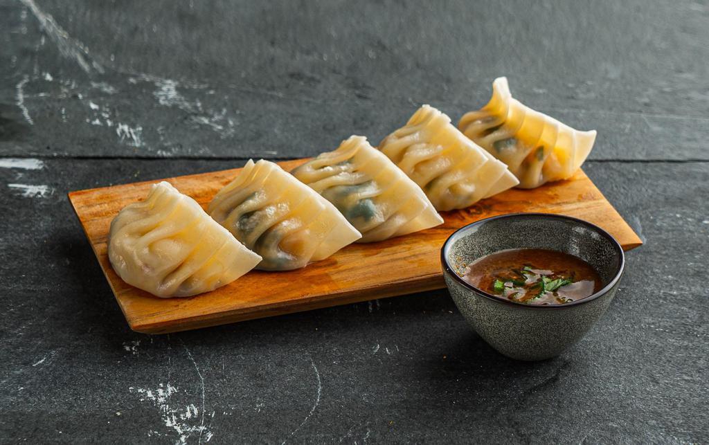 Pork & Vegetable Dumplings . · Pork & Chinese celery dumplings (5pcs).
Served with sweet soy dipping sauce.
Contains: Gluten, Soy