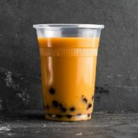Mango Earl Grey Milk Bubble Tea · Mango earl grey milk tea with tapioca pearls. Made with oat milk.