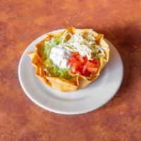 Taco Salad · Shredded chicken or ground beef, lettuce, tomatoes, rice, beans, sour cream, and shredded ch...