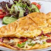 Pastrami and Cheddar Cheese Omelette · Fresh eggs, pastrami, and cheddar cheese omelet.