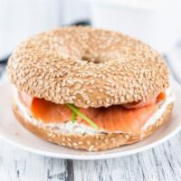 Bagel with Nova Scotia Salmon and Cream Cheese · Cream cheese spread on a fresh-baked bagel and topped with thinly sliced salmon.