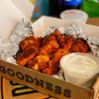 Bone-in Hot Wings · 8 wings. Oven cooked bone-in wings. Choose hot or mild, ranch or blue cheese. 