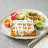 Chicken Tacos Dorados Platter · 4 rolled up fried tortillas stuffed with chicken. Topped with lettuce, tomato, sour cream, C...