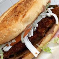 Breaded Chicken Torta · Mexican Sandwich with Breaded Chicken Cutlet, Bean Spread, Cheese, Lettuce, Jalapeno, Tomato...
