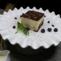 Tiramisu · Coffee flavored dessert, made of ladyfingers dipped in coffee, layered with a cream cheese w...