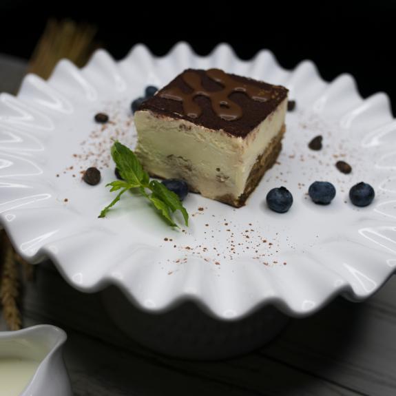 Tiramisu · Coffee flavored dessert, made of ladyfingers dipped in coffee, layered with a cream cheese whipped mixture.