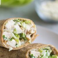 The Caesar Wrap · Chicken breast, romaine lettuce, Swiss cheese and Caesar dressing. Served with free can soda...